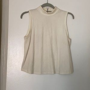 Semi turtle neck sleeveless shirt